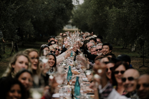 People enjoying a meal at Whispering Brook