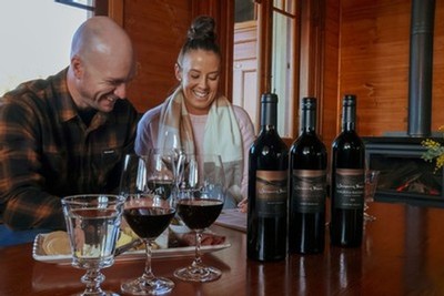 Couple enjoying wine at the cellar door