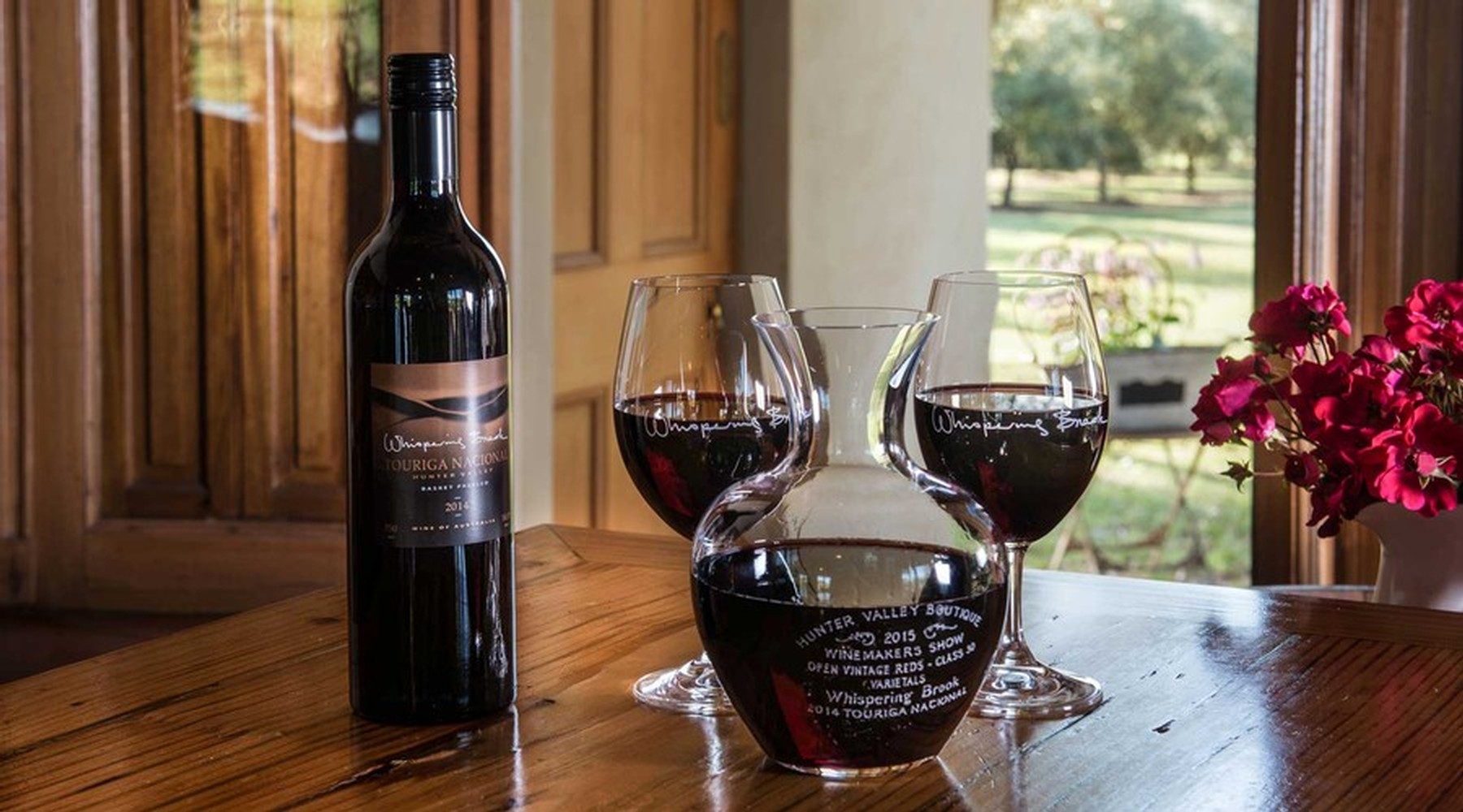 Whispering Brook wine glasses and bottles