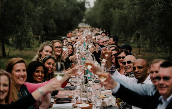 People enjoying a meal at Whispering Brook